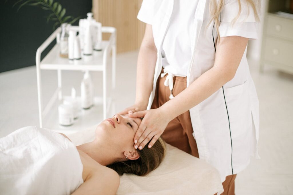 A Woman Having a Head Massage